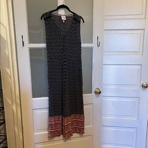 Sleeveless Black jumpsuit with Red Hem Accent